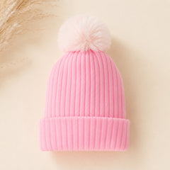 Warm pink acrylic baby hat for 0 to 18 months