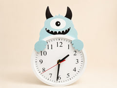 Friendly monster table clock with black numbers and red second hand