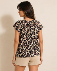 Women’s short sleeve blouse with abstract pattern