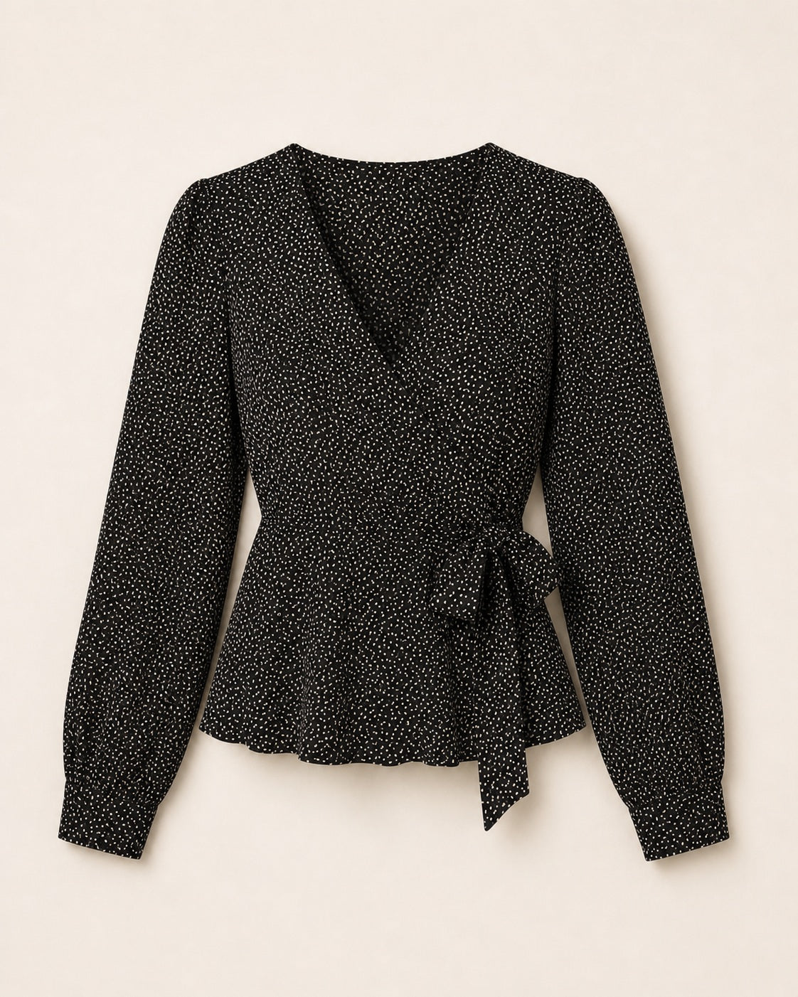 Women’s black V-neck top with white dot print