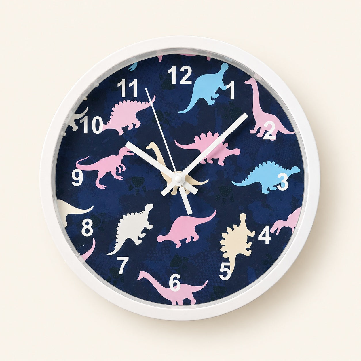 Blue dinosaur wall clock with pastel dinosaurs and white frame on a warm beige background