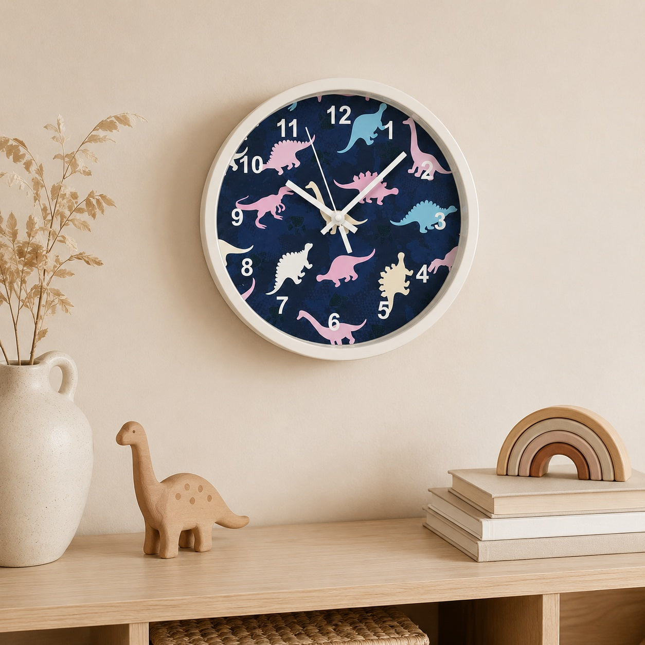 Dinosaur wall clock with pastel colours in a warm neutral nursery interior