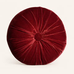 Soft round pumpkin cushion in deep red velvet fabric