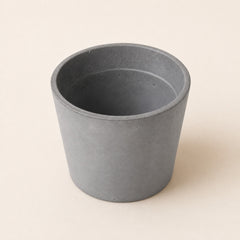 Round grey flowerpot with matte ceramic finish