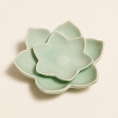 Ceramic flower candle holder in soft green colour