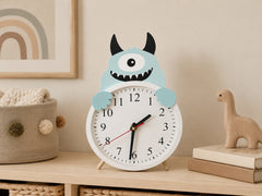 Cute monster clock for children’s room with black horns