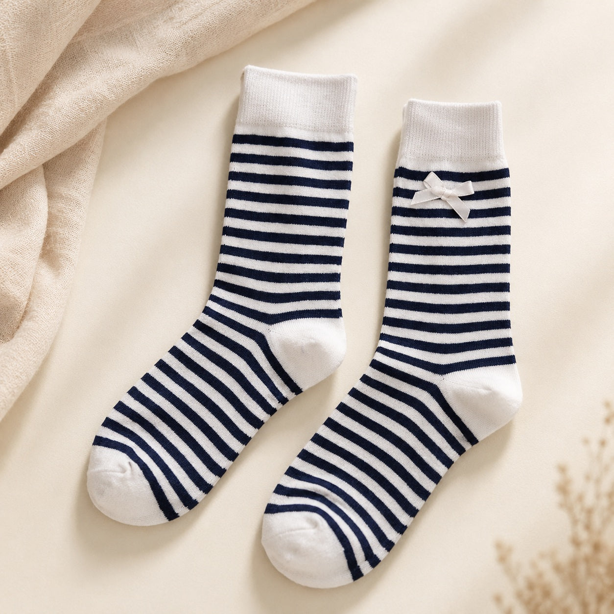 Navy striped girls socks with bow detail and pink polka dot socks