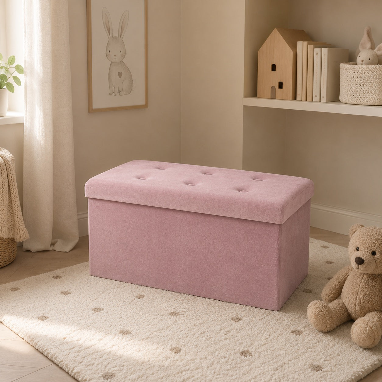 Pink velvet storage bench in a softly styled children’s room