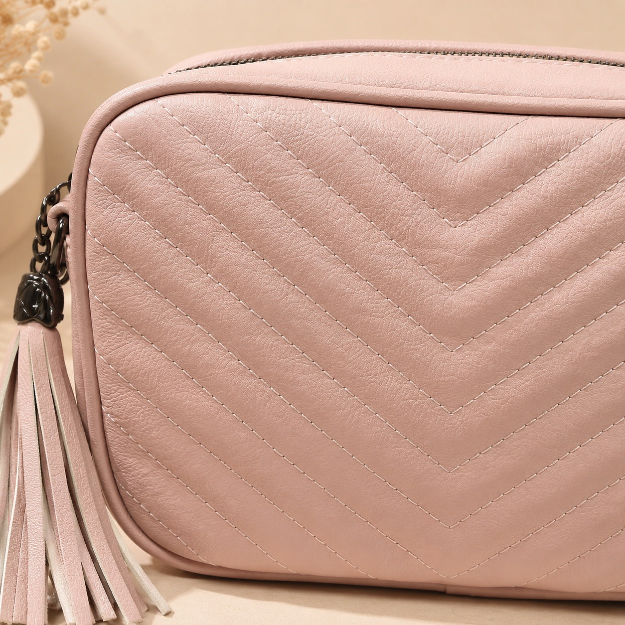 Serilda leather camera bag with chevron stitching
