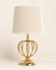 Elegant table lamp with white shade and gold base