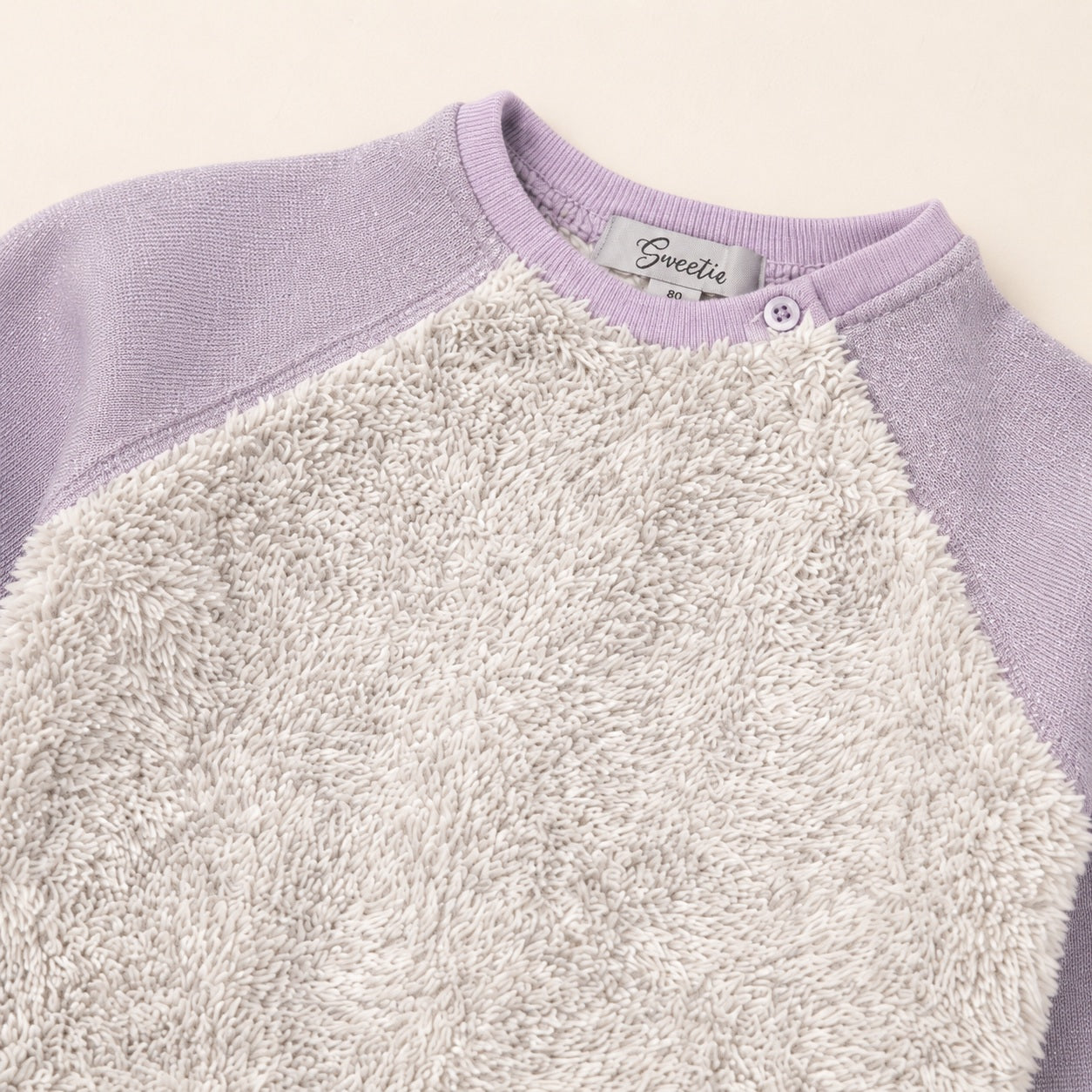 Sweetie Danita baby sweatshirt with shoulder button closure