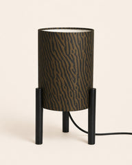 Modern tripod table lamp with patterned gold shade