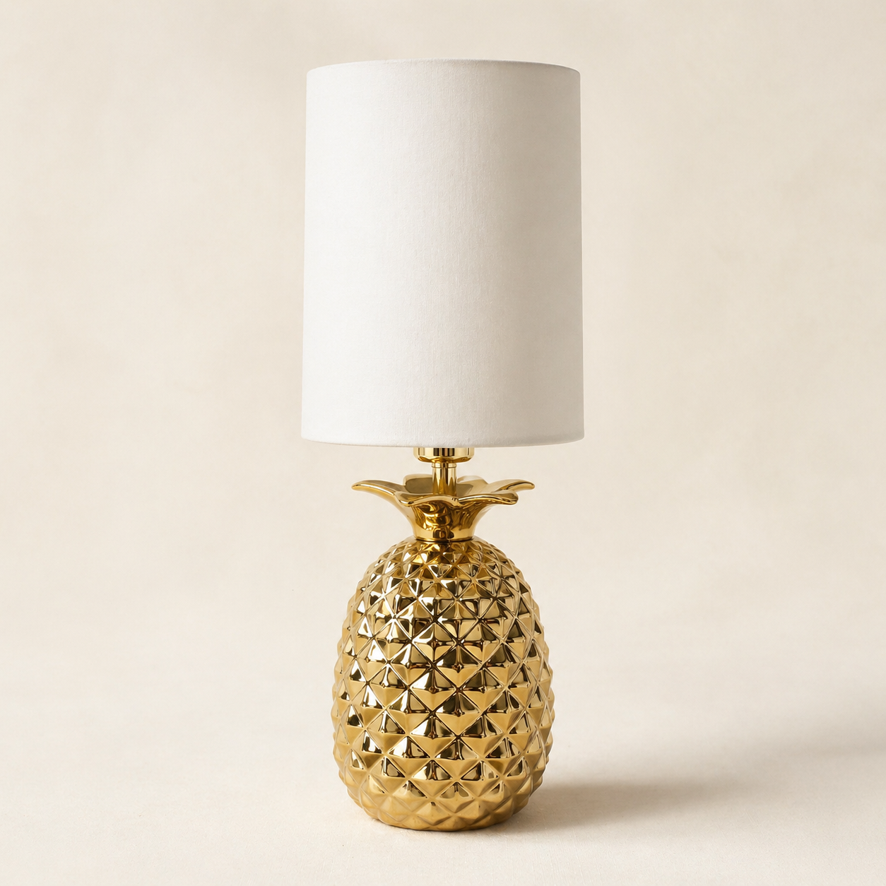 Gold metal pineapple table lamp with fabric lampshade