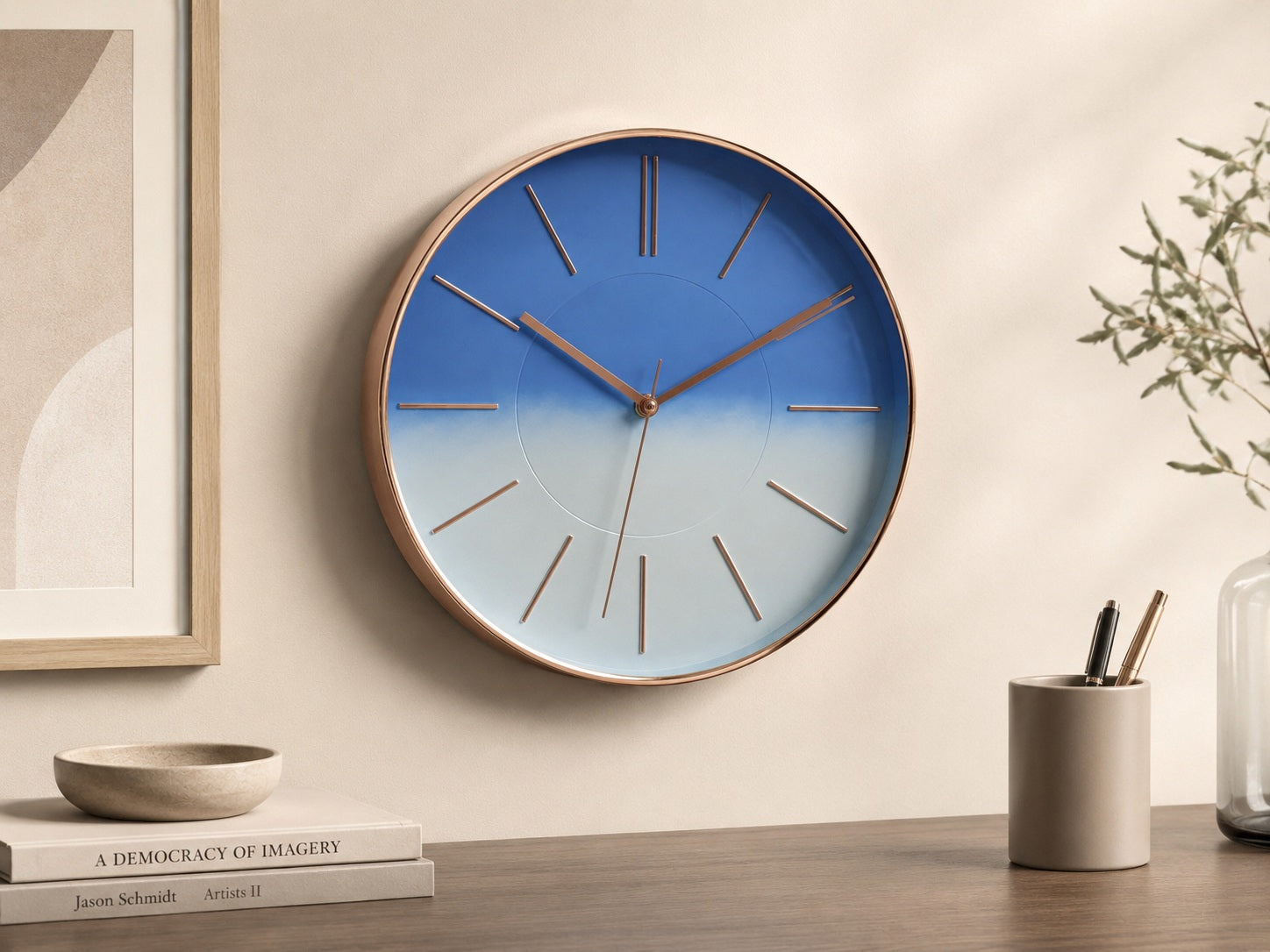 Tyra blue wall clock with rose gold details