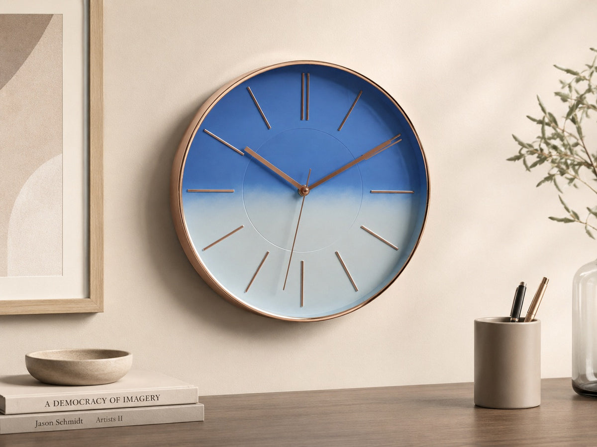 Tyra blue wall clock with rose gold details
