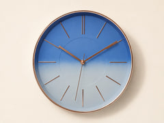 Modern blue gradient wall clock with rose gold rim