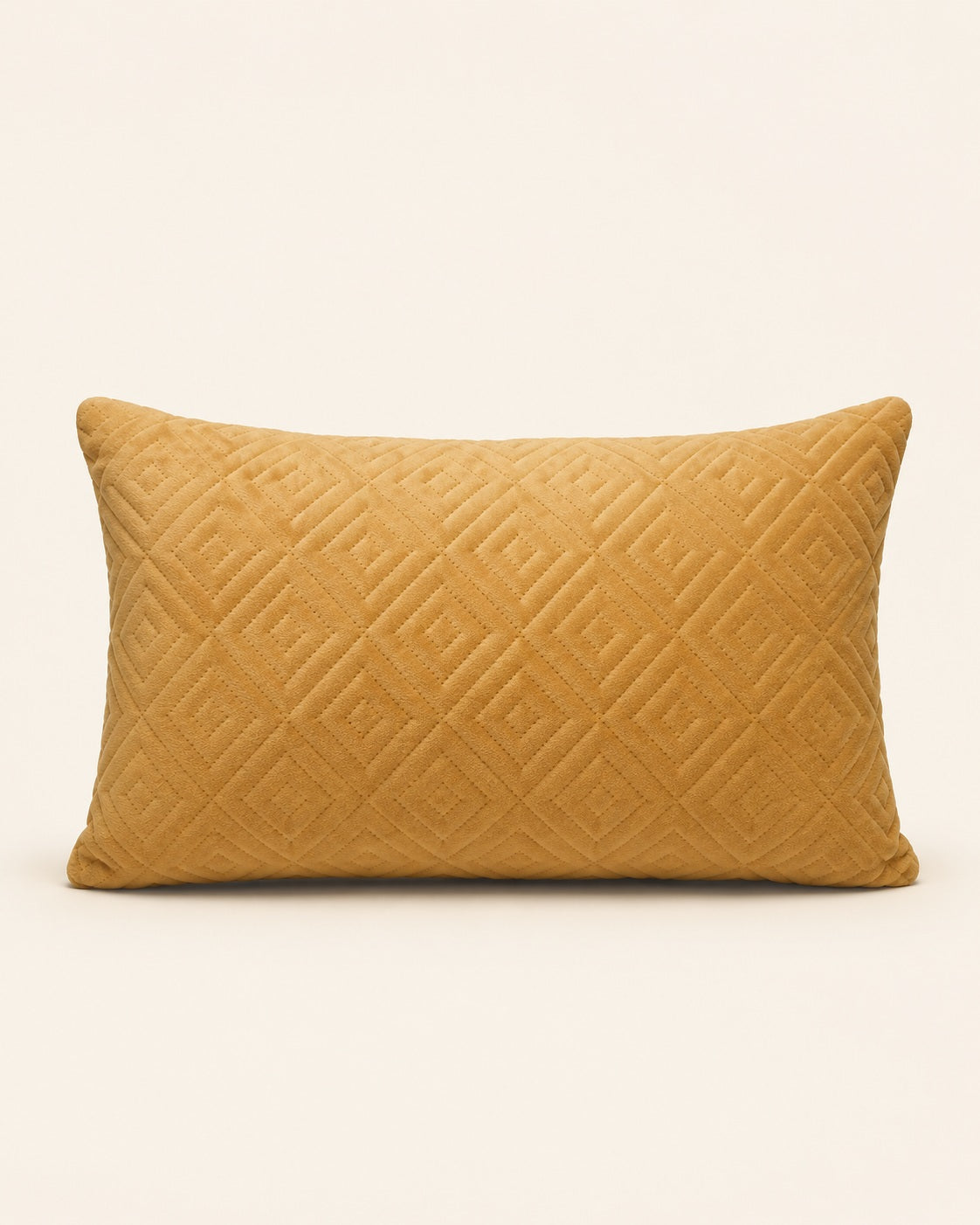 Mustard yellow velvet cushion with geometric pattern detail