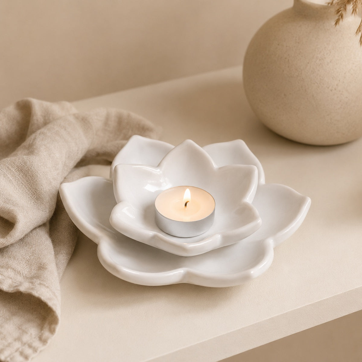 White ceramic flower tealight holder for home decor