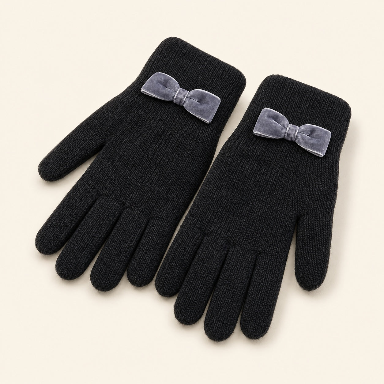 Black winter gloves for women with soft bow accent