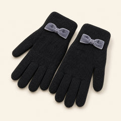 Black winter gloves for women with soft bow accent